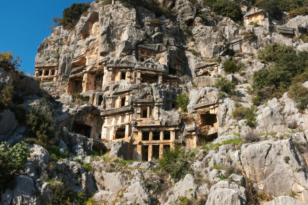 Explore the historical rock-cut tombs at Myra in Demre, Antalya, symbolizing Anatolian heritage.